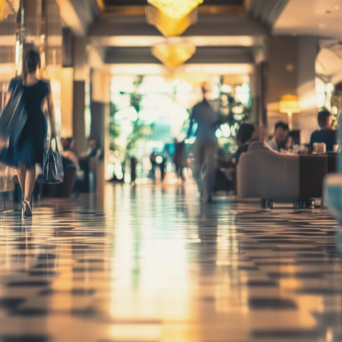 Soft focus busy modern hotel lobby