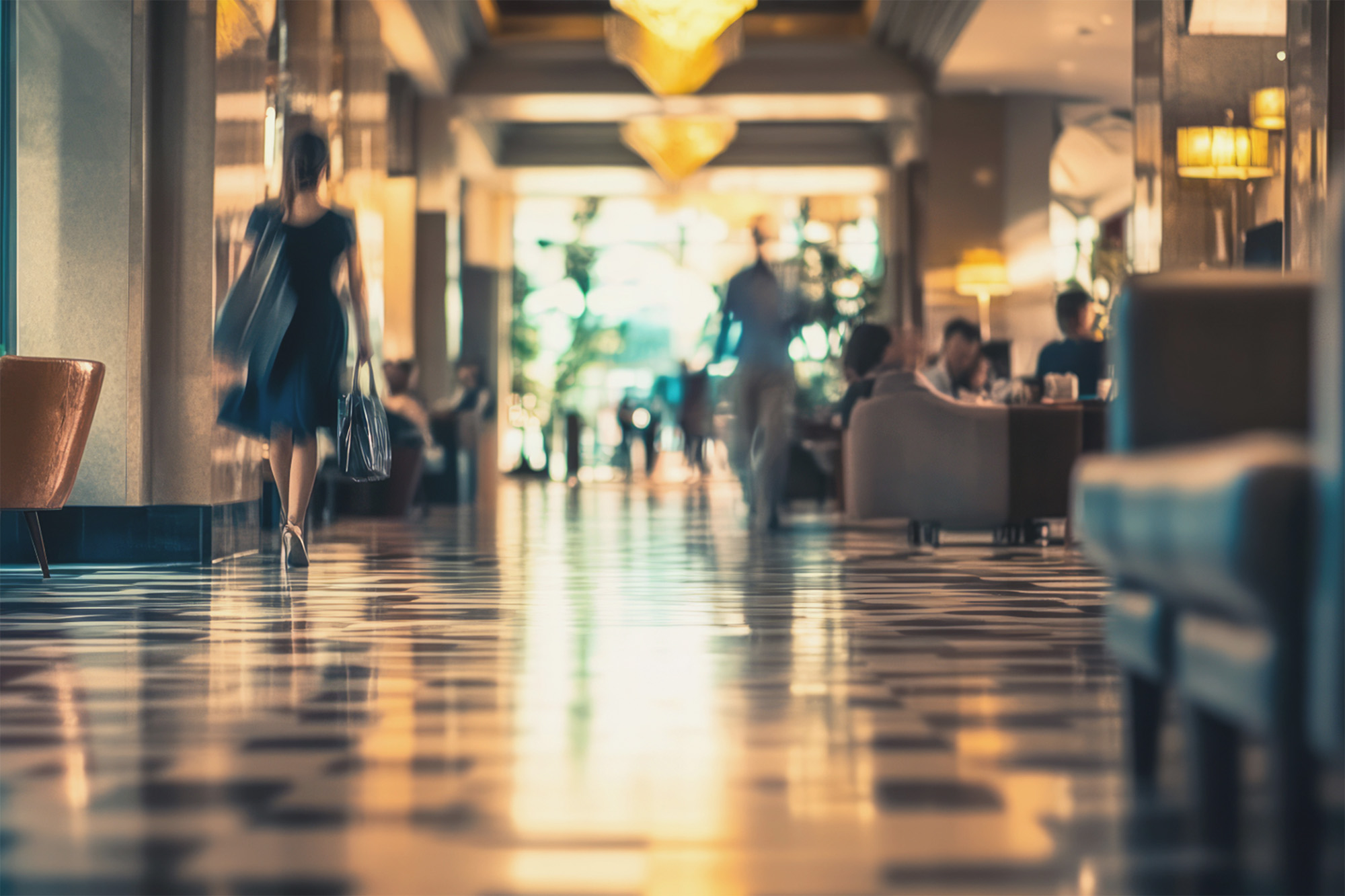 Soft focus busy modern hotel lobby
